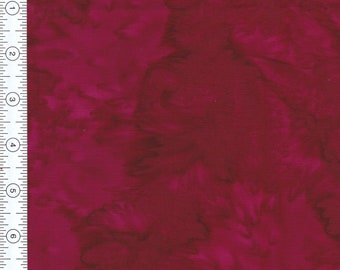 Fabric Mauve Batik or Moda. There is no info or color strip on the fabric to identify.  Water splatter look in print. Sold by half yd.