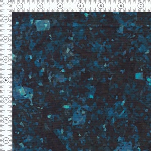May include: A dark blue fabric with a scattered pattern of iridescent blue and teal geometric shapes.