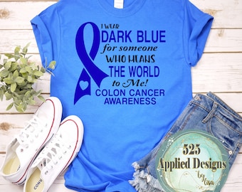 May include: Blue t-shirt with a dark blue ribbon and the text "I wear dark blue for someone who means the world to me! Colon Cancer Awareness".