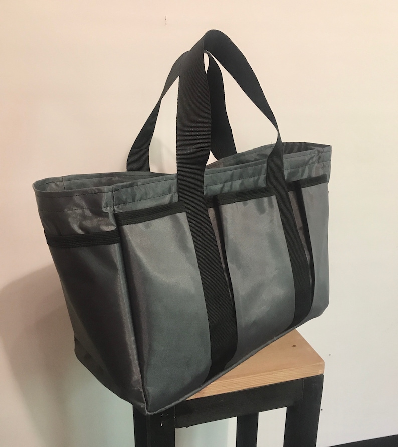 gray 10 pockets with zipper. Roomy bag for shopping picnic