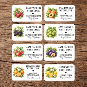 May include: A collection of rectangular labels for homemade preserves. The labels feature the phrases "Jam Packed With Love" and "Homemade With Love", along with illustrations of fruits such as raspberries, apricots, blackberries, gooseberries, strawberries, damsons, oranges, and lemons.