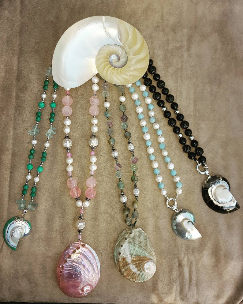Nautilus necklace with aquamarines river and silver pearls