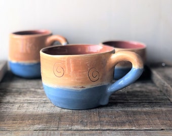 Three-piece set of handmade ceramic mugs