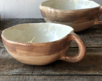 The two handmade cereal bowls in ceramic
