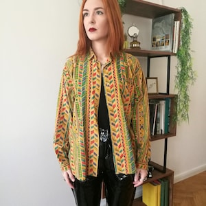 Vintage colorful shirt in crazy geometric pattern