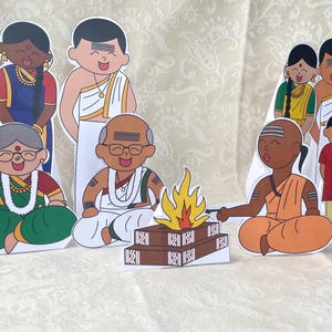 Puede incluir: Una colección de recortes ilustrados y coloridos que representan a una familia del sur de Asia y figuras religiosas. Las figuras visten ropa tradicional, con una figura central cuidando un pequeño fuego. El tema general es cultural y religioso.