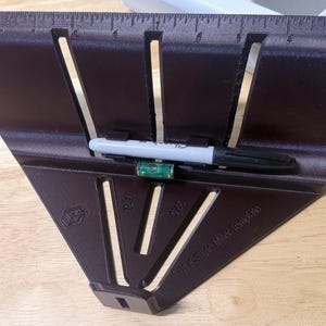 May include: A white ceramic mug with a black handle and the text "But first, coffee" in a handwritten style. The mug is on a white surface. The mug is approximately 4 inches tall.