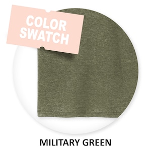 May include: A close-up of a fabric swatch in military green. The swatch is circular and has a textured surface.