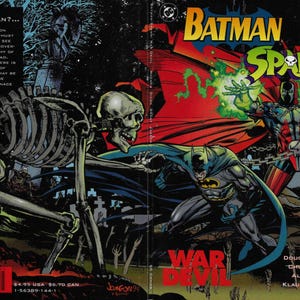 May include: Comic book cover featuring Batman and Spawn in a battle scene. The title "Batman Spawn" is in large, colorful letters. The artwork includes a skeleton, a cityscape, and the words "War Devil."