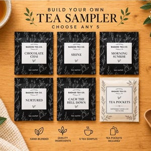 May include: Five black tea sachets with white labels featuring the text Badass Tea Co. and flavor names Chocolate Chai, Shine, Morning Sunrise, Nurtured, and Calm The Hell Down, plus one beige packet labeled Tea Pockets for loose-leaf tea filters.