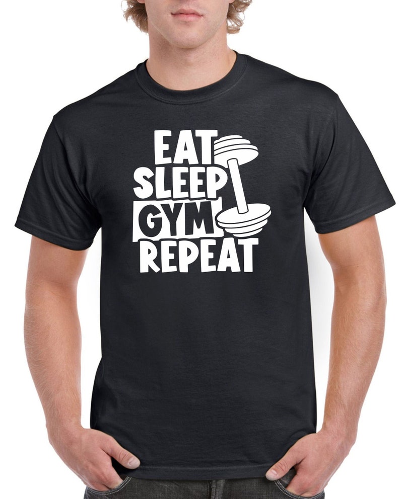 May include: Black t-shirt with white text that reads "Eat Sleep Gym Repeat" and a white dumbbell graphic.