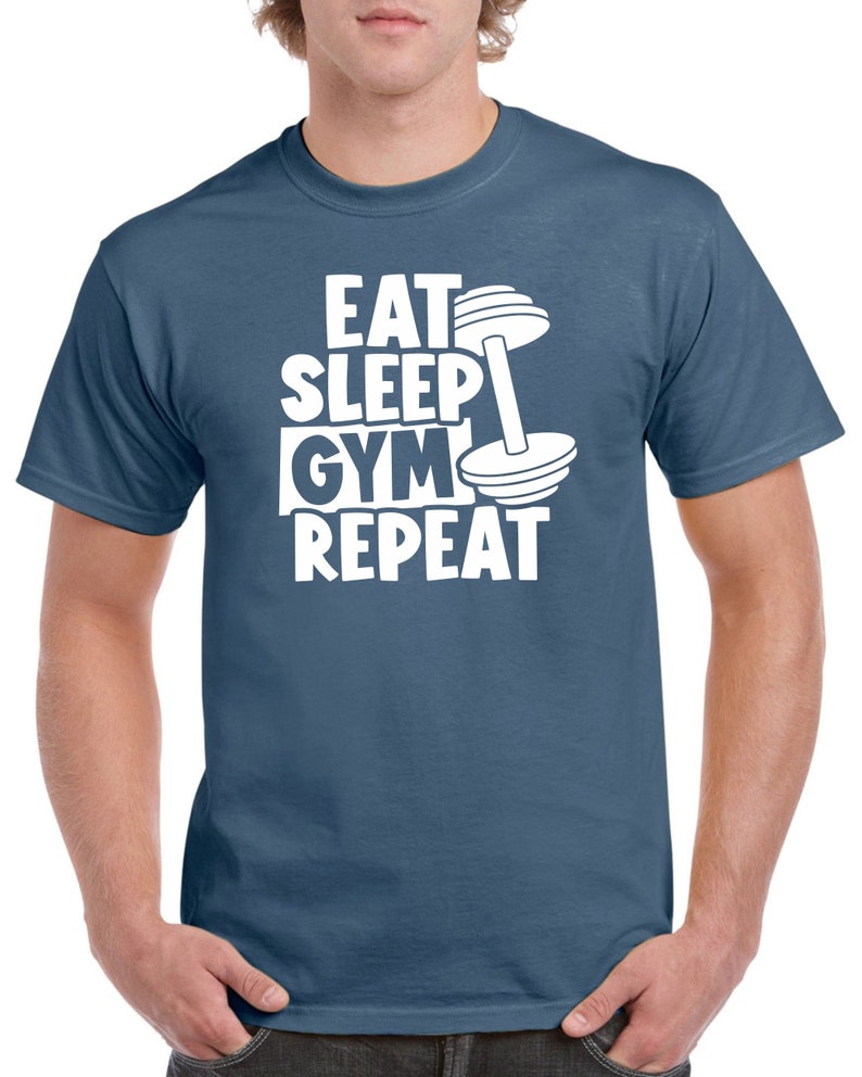 May include: A blue t-shirt with white text that reads "Eat Sleep Gym Repeat" and a white dumbbell graphic.