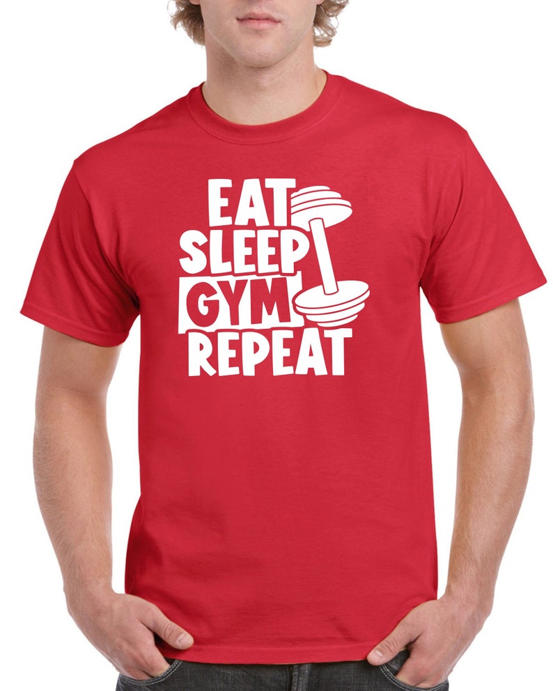 May include: Red t-shirt with white text that reads "Eat Sleep Gym Repeat" and a white dumbbell graphic.