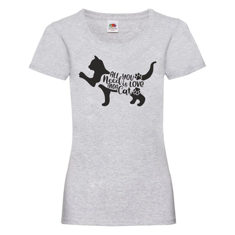 May include: Gray t-shirt with a black silhouette of a cat and the text "All you need is love and a cat" printed on the front.