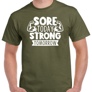 May include: A green t-shirt with white text that reads "Sore Today Strong Tomorrow" with a graphic of two bicep muscles.