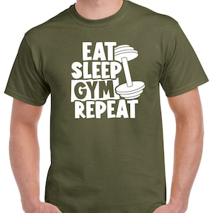 May include: A green t-shirt with a white graphic that says "Eat Sleep Gym Repeat" with a dumbbell graphic.