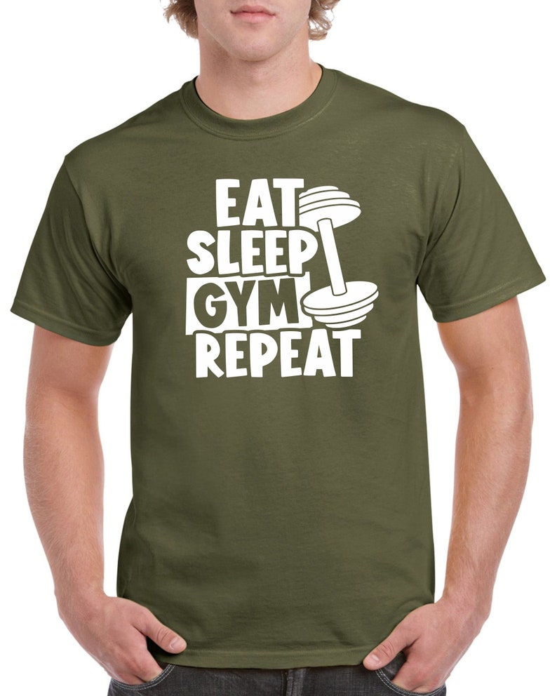 May include: A green t-shirt with a white graphic that says "Eat Sleep Gym Repeat" with a dumbbell graphic.