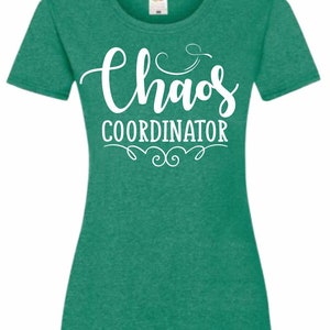 May include: A green t-shirt with the text "Chaos Coordinator" in white lettering.
