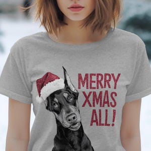 Kerst T-shirt Kerst T-shirt Dobermann pinscher hond kerstmuts hondenliefhebber geschenken huisdier kerstshirt vakantie seizoen Merry Xmas T-shirt
