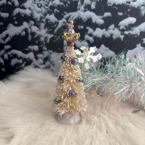 Miniature Christmas Tree with a crown topper