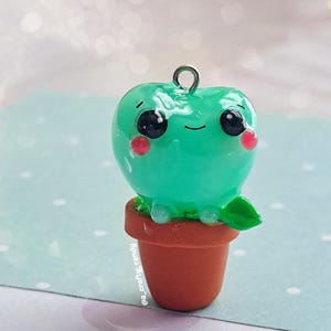 Ciondolo kawaii a forma di rana in vaso