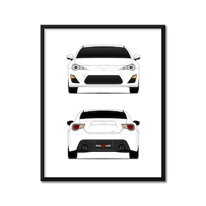 May include: A framed print featuring a white sports car, shown from the front and rear. The front view displays headlights and a black grill. The rear view shows taillights and dual exhaust pipes. The artwork is set against a white background.