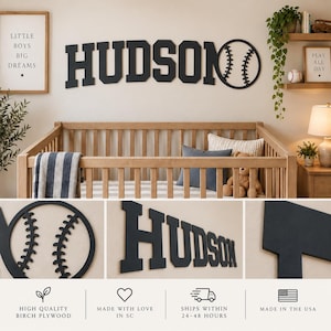 May include: A black wall-mounted sign featuring the name HUDSON in a bold, block-style font, accompanied by a circular baseball graphic with stitched detailing. The letters and baseball icon are crafted from a solid, matte-finished material.