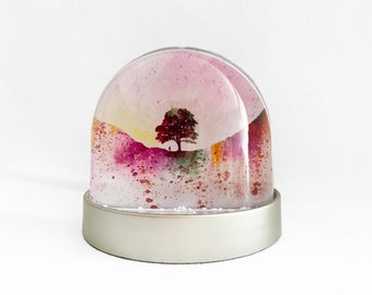 Snow Globe of Sycamore Gap, Hadrians Wall, watercolour images of  Sycamore Gap in water colour.  Gift or Christmas decoration