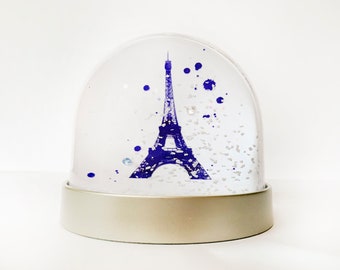 Snow Globe of The Eiffel tower in Paris, watercolour abstract image,Snow shaker Christmas decoration