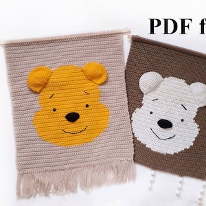 May include: Two crocheted wall hangings featuring bear faces. The first is beige with a yellow bear face and a fringe border. The second is brown with a white bear face and white beads hanging from the bottom. The text "PDF file" is visible in the upper right corner.