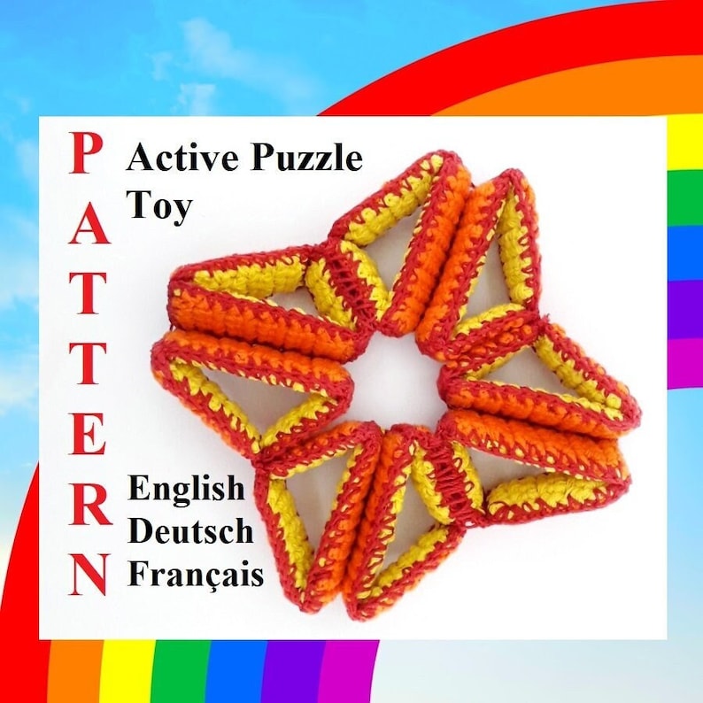 May include: A red and yellow crocheted star-shaped puzzle toy. The toy is made of interlocking triangles. The text "Active Puzzle Toy" is written in red letters on a white background. The text "PATTERN" is written in red letters vertically on a white background. The text "English, Deutsch, Fran&ccedil;ais" is written in black letters on a white background.