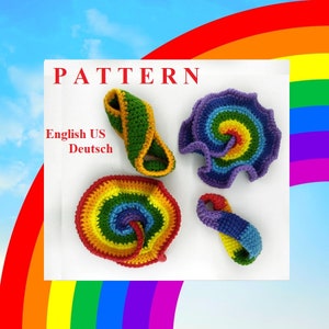 May include: A crochet pattern for four rainbow-colored crocheted objects. The objects are a spiral, a loop, a flat spiral, and a twisted loop. The pattern is available in English and German.
