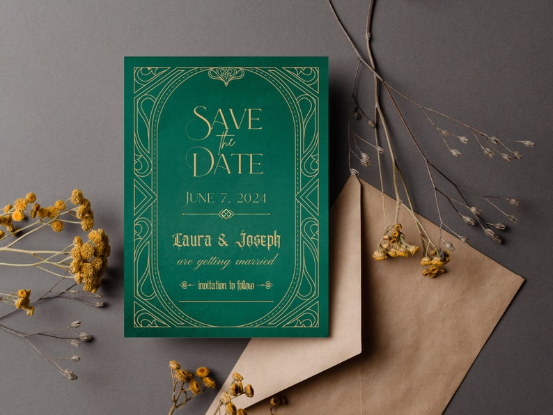 May include: Emerald green "Save the Date" wedding invitation with gold lettering and decorative border. The invitation includes the date "June 7, 2024" and the names "Laura & Joseph". A brown envelope and dried flowers are also in the image.