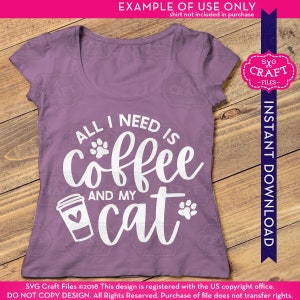 May include: Purple t-shirt with white text that reads "All I need is coffee and my cat" with a coffee cup and paw print graphic.