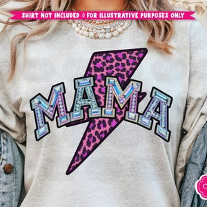 May include: A gray t-shirt with a pink leopard print lightning bolt and the word "MAMA" in iridescent rhinestones.