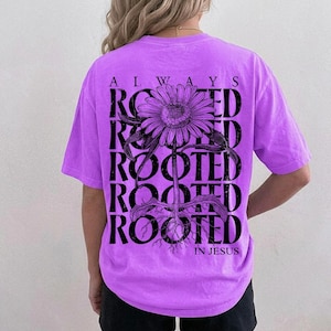 Always Rooted in Jesus Christian floral PNG with daisy and roots.