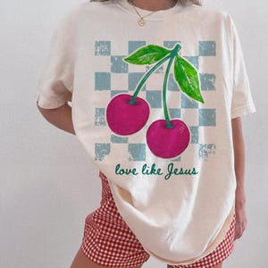 Feminine Christian PNG featuring pink cherries and retro aesthetic artwork.
