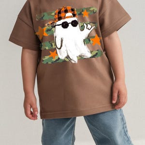Halloween boy PNG featuring a ghost with orange plaid hat and cool shades