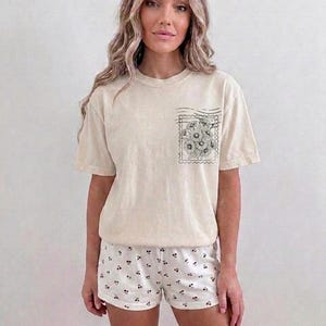 Neutral toned Christian mom graphic with botanical stamp illustration and retro church apparel style