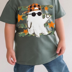 Boy spooky season design featuring ghost, camouflage stripes, and orange accents