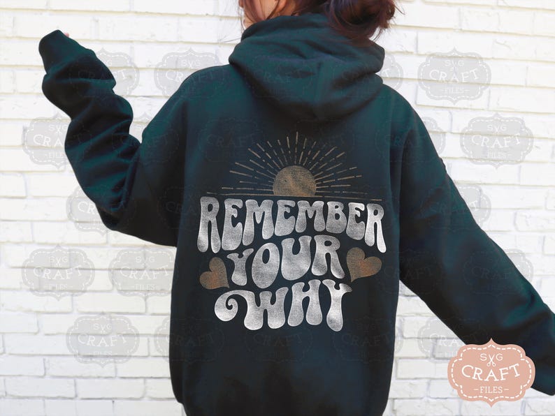 May include: A dark green hoodie with a white graphic that says "Remember Your Why" with a sun and hearts.