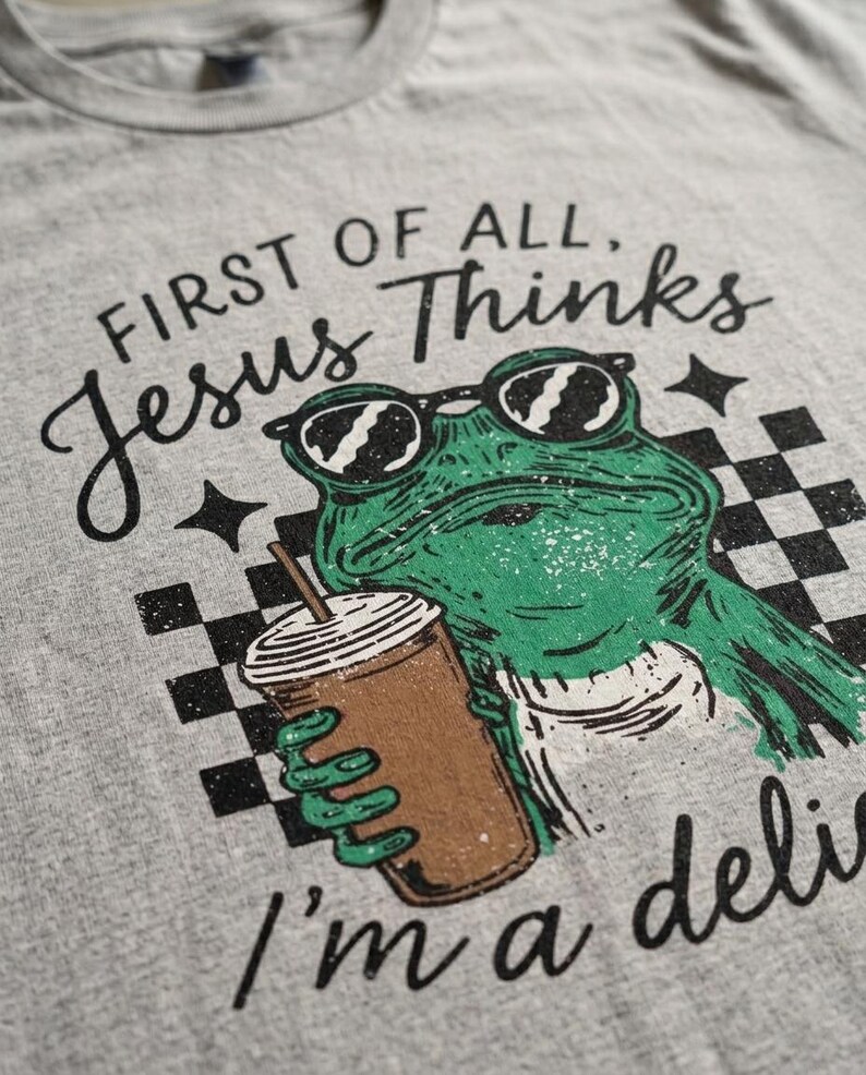 Funny faith based PNG featuring green frog illustration and checkerboard pattern details.