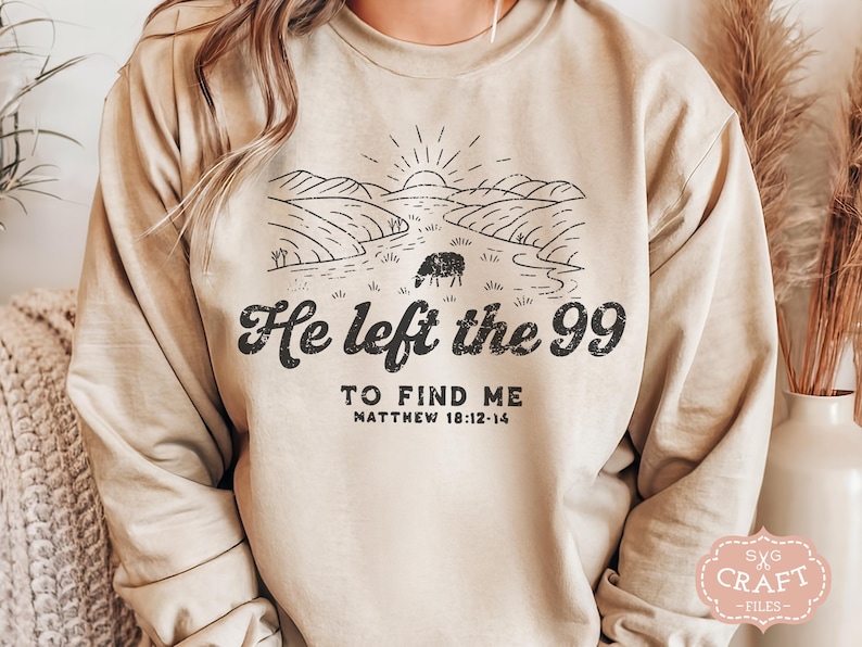 May include: A beige sweatshirt with a black graphic design of a sheep in a field with the text "He left the 99 to find me Matthew 18:12-14".