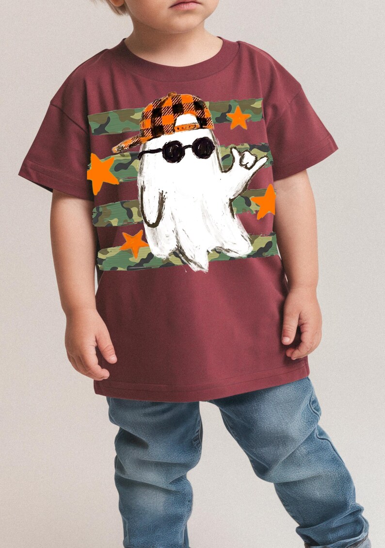 Kids spooky season shirt design with hand-drawn ghost and camo stripes