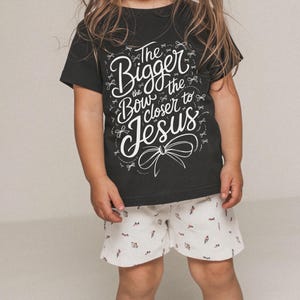 Faith-inspired girls bow design for Christian youth shirts