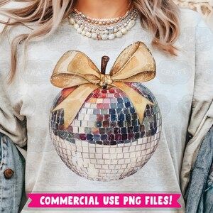 May include: A white t-shirt with a gold bow and a disco ball ornament. The text "COMMERCIAL USE PNG FILES!" is printed on the bottom of the shirt.