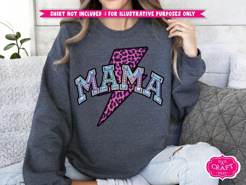 May include: A dark gray sweatshirt with a pink and black leopard print lightning bolt and the word "MAMA" in rhinestones.