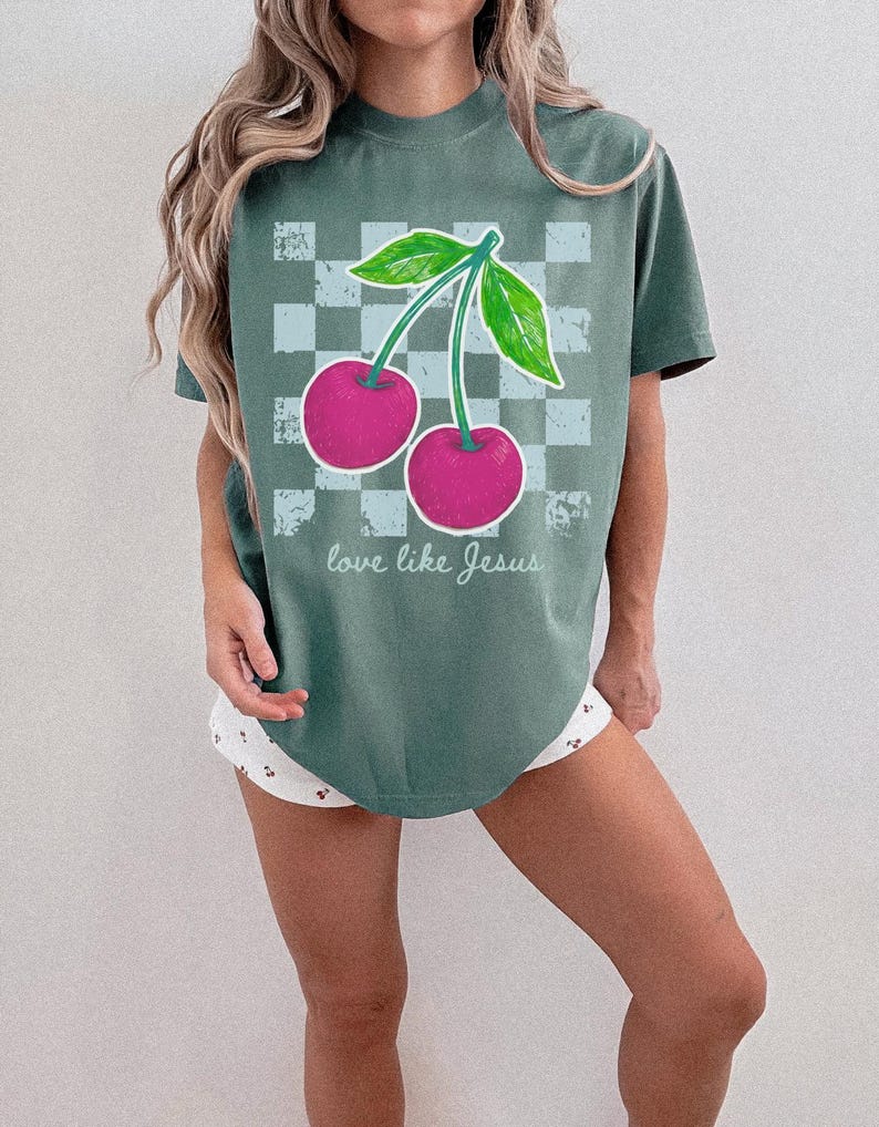 Boutique Christian apparel design with cherries and trendy checkerboard pattern.