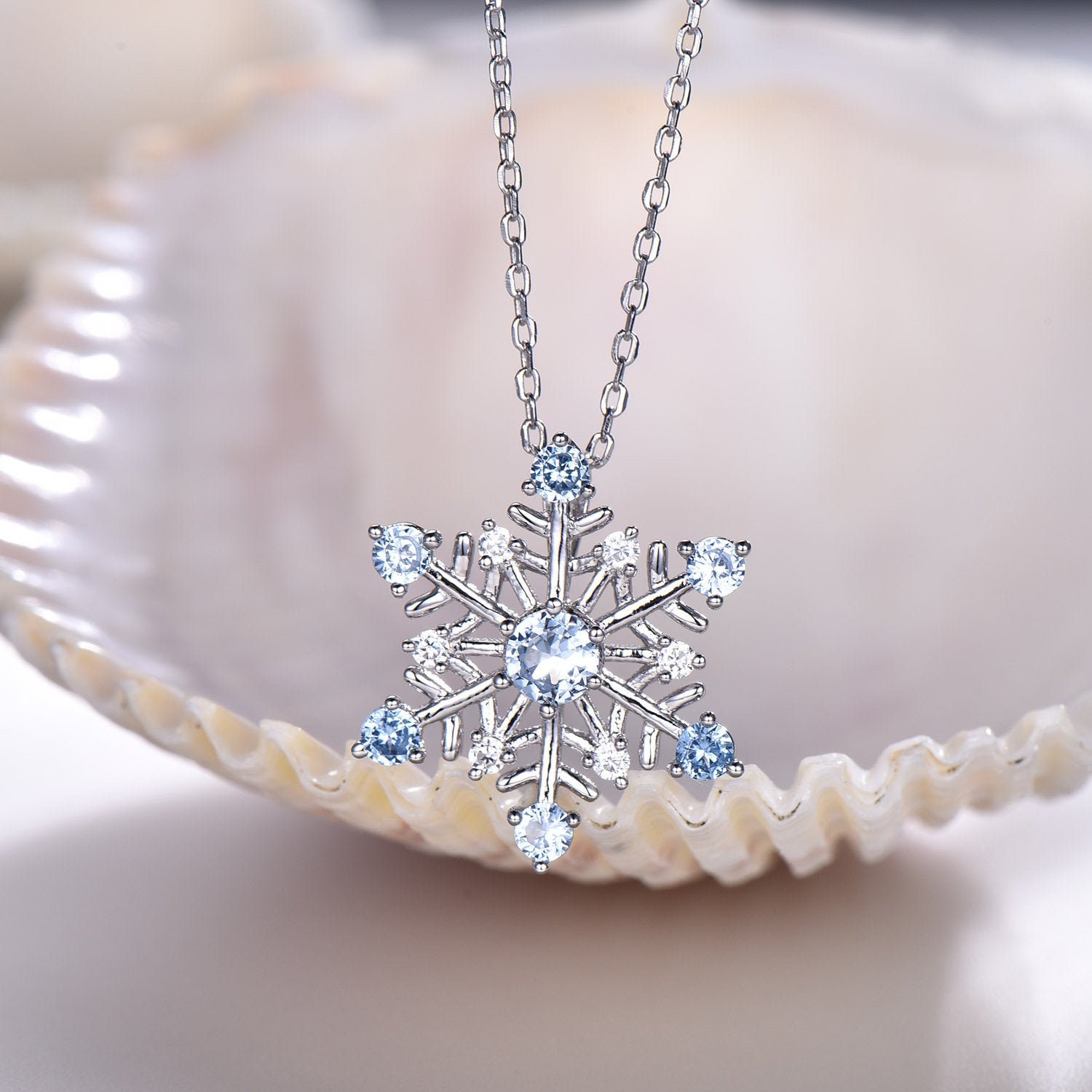 Blue snowflake necklace best sale