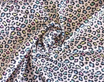 Pasteles de leopardo y tejido de lycra de algodón rosa
